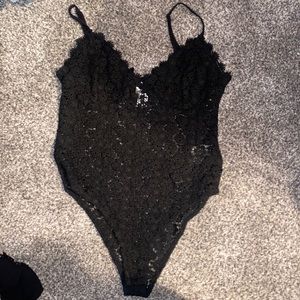 Black crochet body suit from H&M. Medium. Never worn.